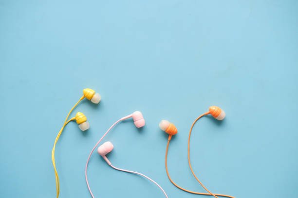 top view of colorful earphone on white background .